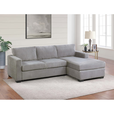 Canapé d'angle contemporain 2 pièces en L gris, avec accoudoirs carrés, pieds en plastique et méridienne, idéal pour le salon et la chambre.