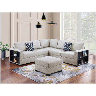 Ensemble de canapé modulaire 4 pièces contemporain avec tablettes intégrées, tissu bouclé gris, design en forme de L pour le confort et le style du salon.