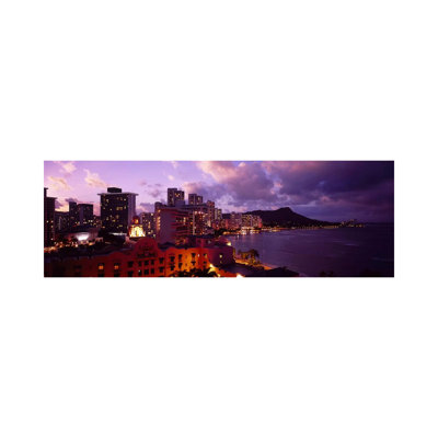 Buildings Lit Up At Dusk, Waikiki, Oahu, Hawaii, USA - Wrapped Canvas Panoramic Print