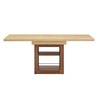 Expandable dining table with storage space