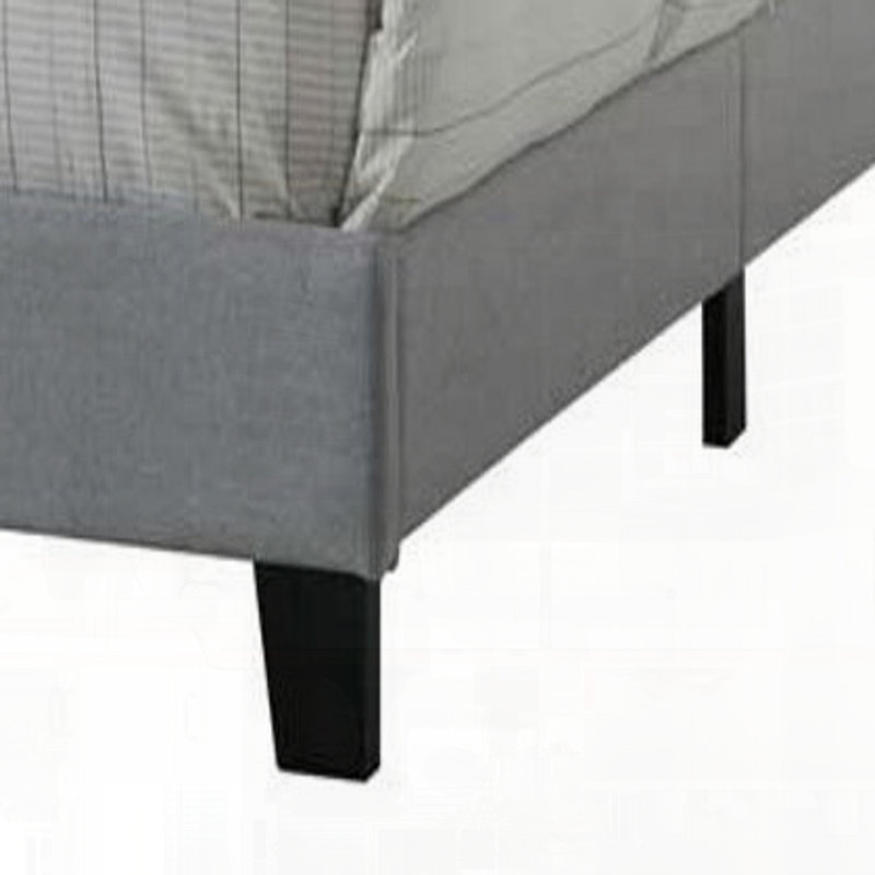 Grand lit gris en tissu