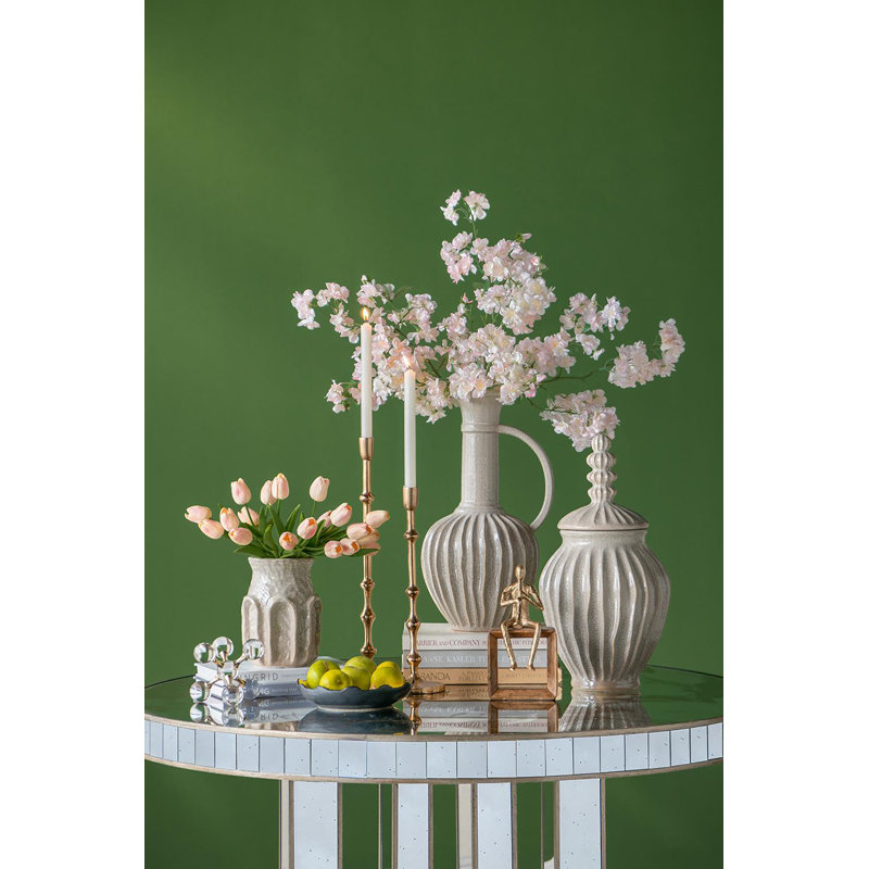 Elegant White Ceramic Jar with Textured Motif and Spherical Finial Lid