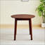 Table ronde en noyer-814354715