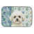 Bichon frisé blanc et crème