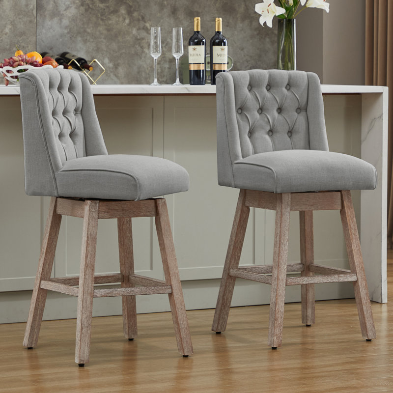 Tabourets de bar rembourrés et pivotants à 360 ° Terron avec pieds en bois Terron, Gris