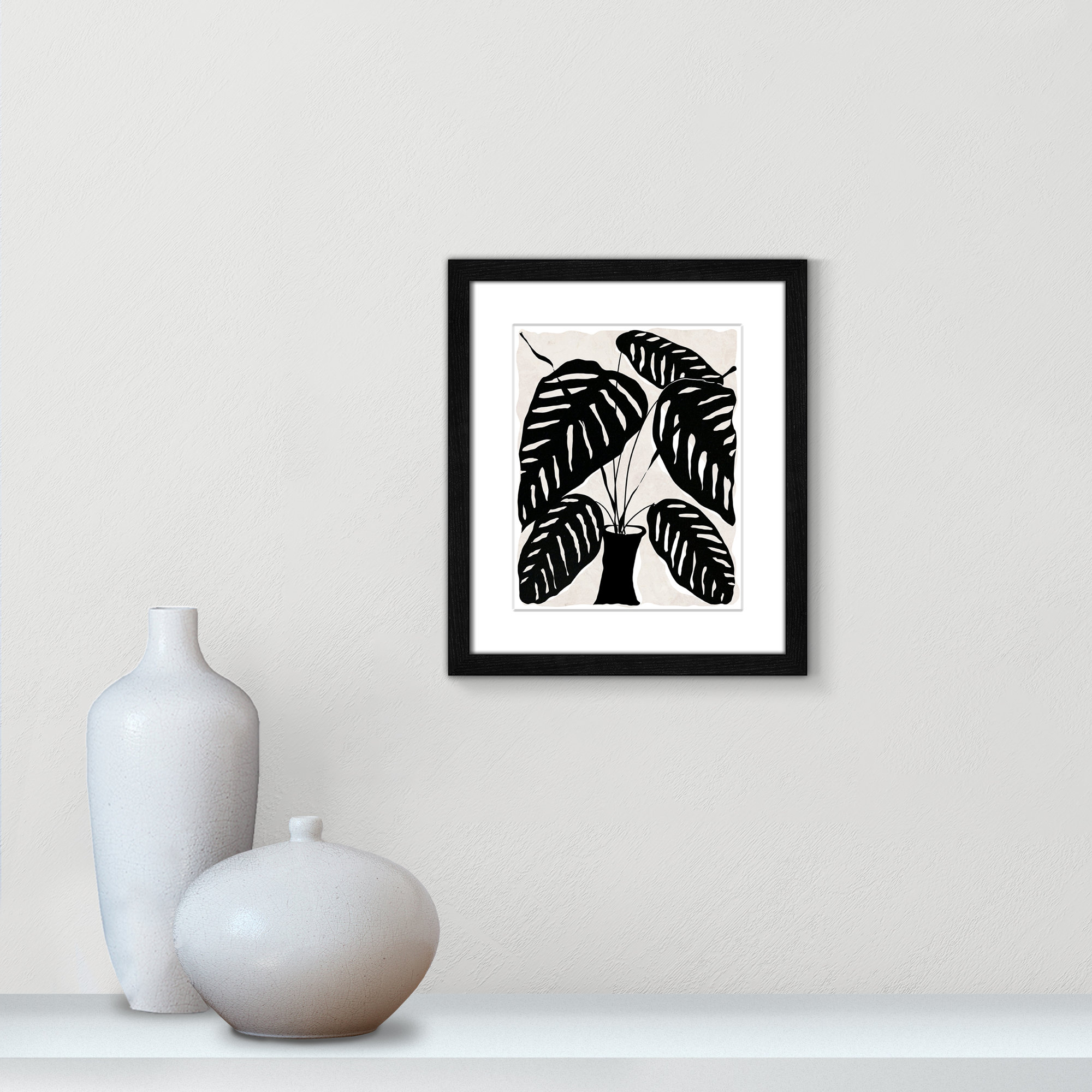Black And White Potted Plant I by Daniela Santiago, 15" H x 13" W x 0.75" D, Black Framed