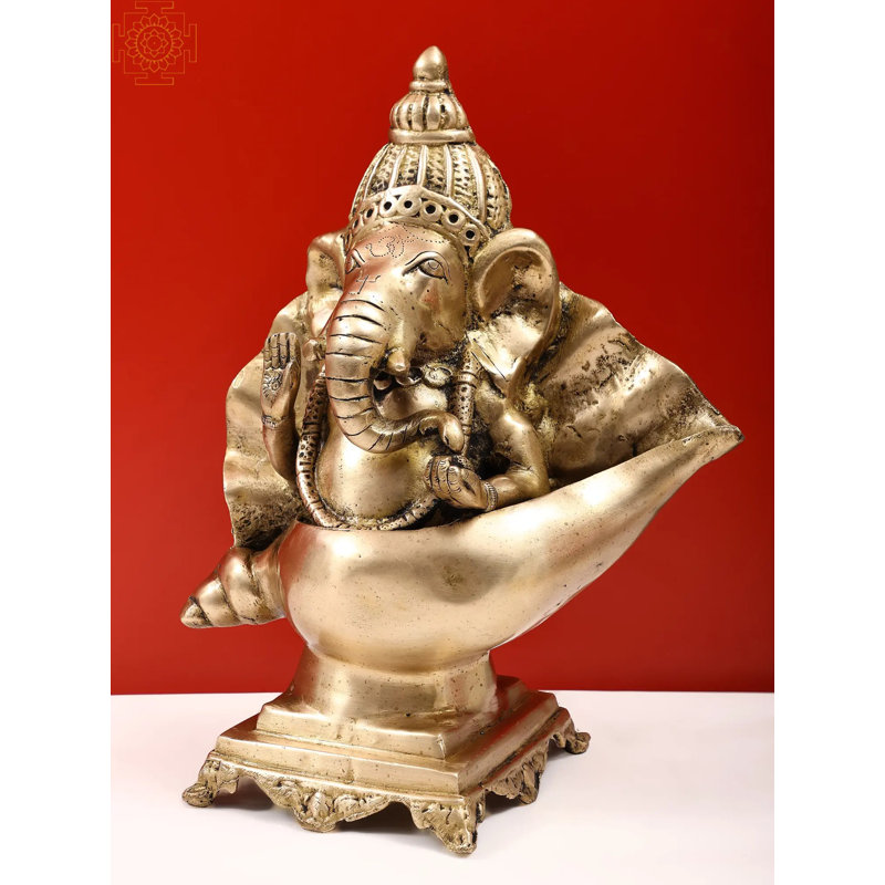 15 po Ganesha assis sur un piédestal de conque