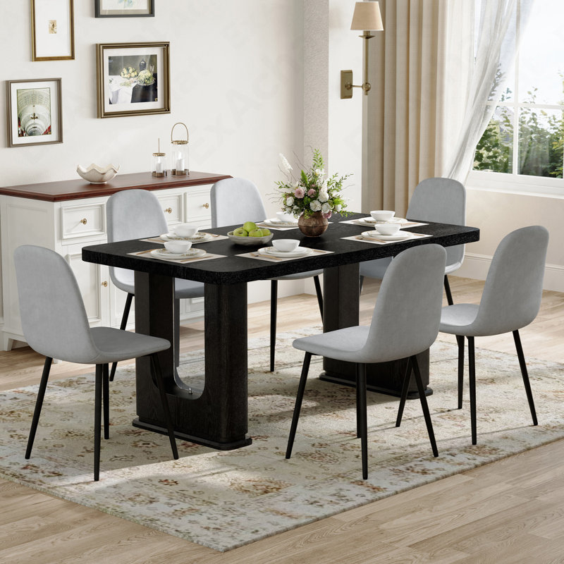 Ensemble de table et de chaises 64,5 po x 35,4 po de style table de salle à manger en bois noir texturé et élégant.