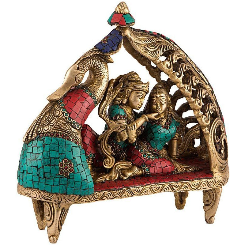 Radha Krishna assise sur un paon