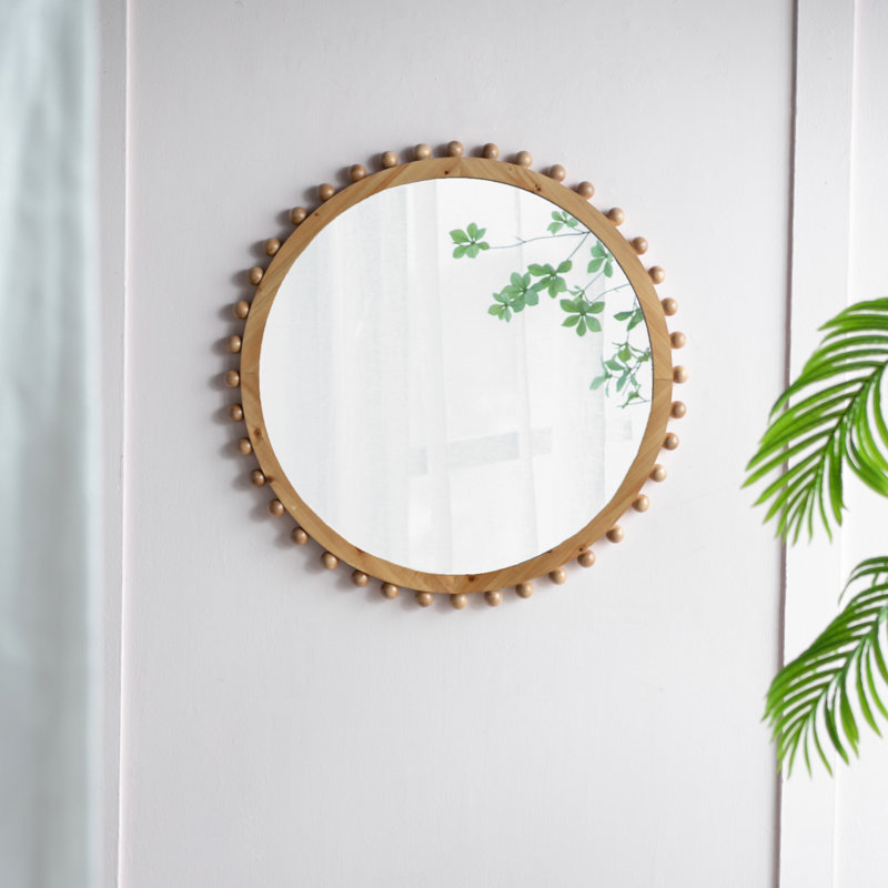 Miroir rond en bois avec cadre perlé
