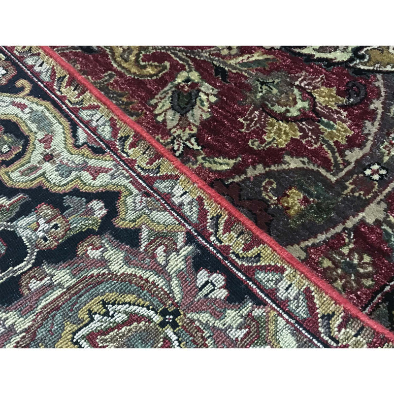 Suruchi Wool Oriental Area Rug in Purple/Black