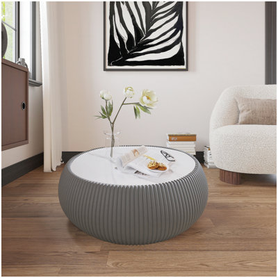 Table basse en cuir gris fritté en forme de tasse pour un mobilier de salon moderne, durable et élégant