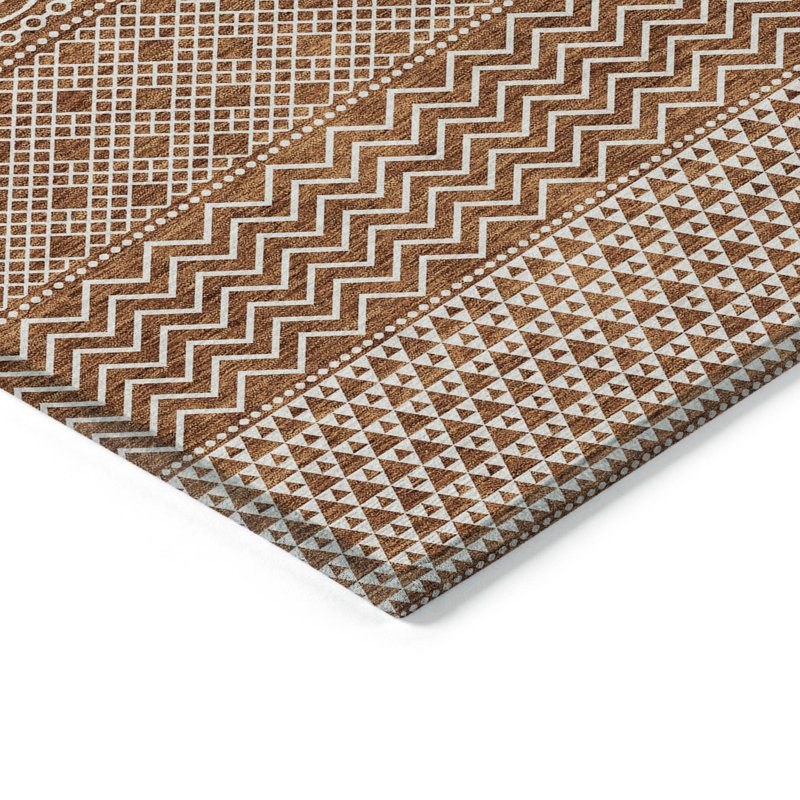 5' X 8' Orange And Ivory Chevron Washable Indoor Outdoor Area Rug
