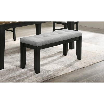 Banc de style contemporain avec coussin rembourré gris et pieds fuselés rectangulaires en bois rembourrés, décoration