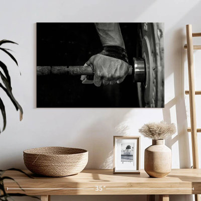 Man holding weights Sireci