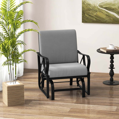 Chaise berçante de patio avec coussin
