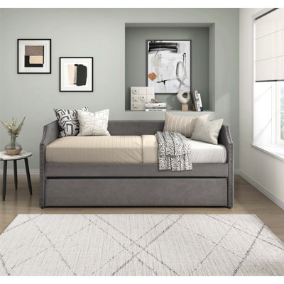 Modern Contemporary Daybed with Trundle, Velvet Upholstered Twin Sofa Bed for Space-Saving Sleep and Seating Solutions.