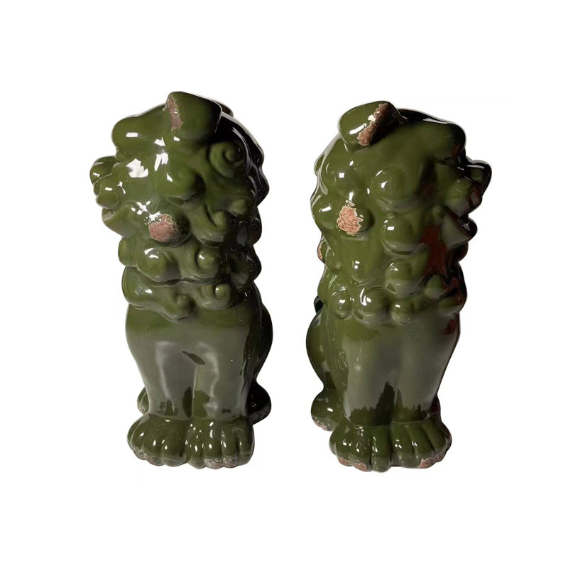 Ensemble de deux sculptures de chien en céramique verte