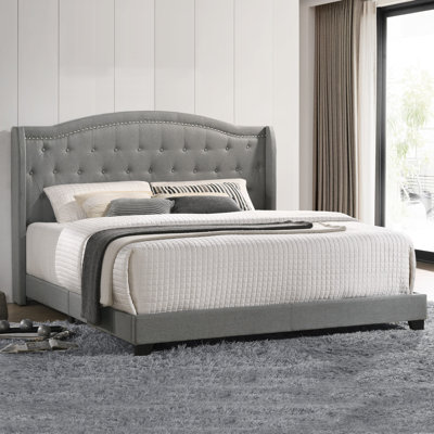 Upholstered Wingback Bed