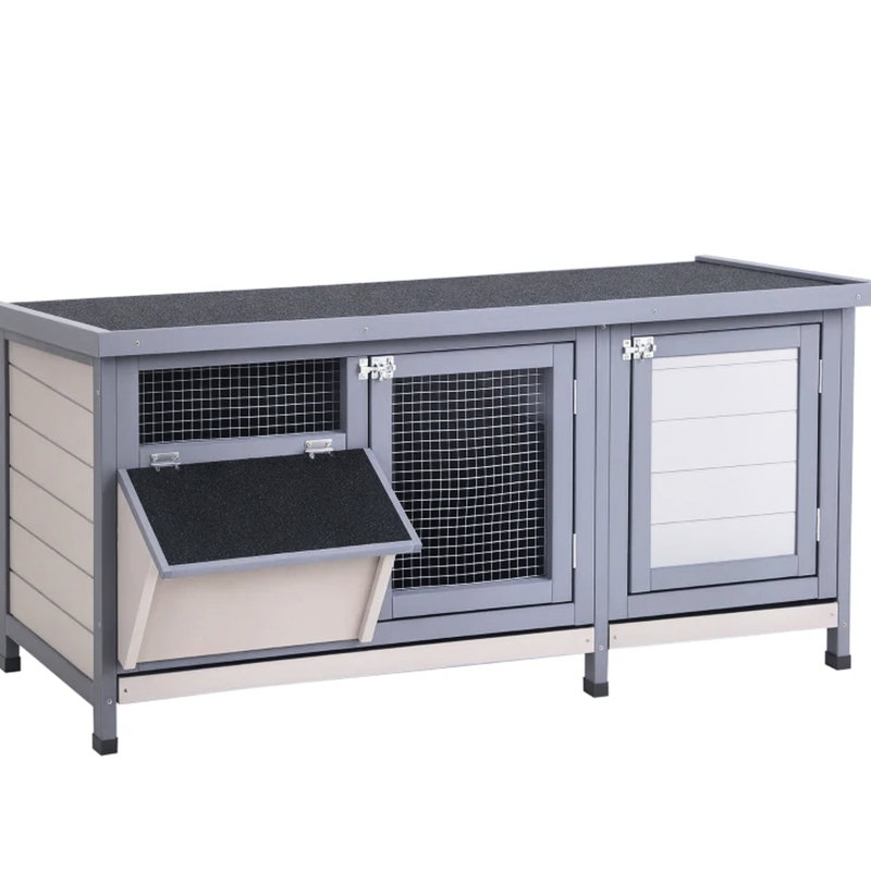 Chenil en bois gris avec toit imperméable