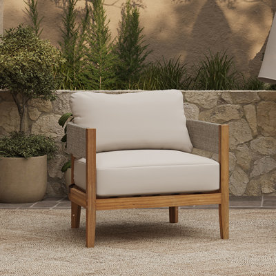 Fauteuil club d'extérieur en bois d'acacia avec côtés en corde et coussins