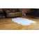 Rixt Tufted Faux Sheepskin Area Rug in Off White