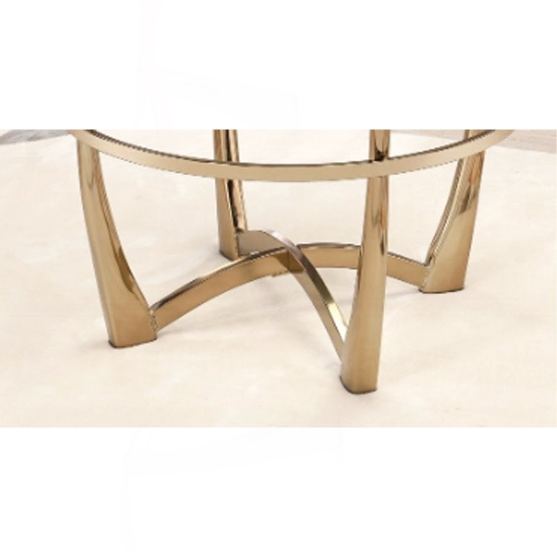 Table basse en verre transparent et finition champagne