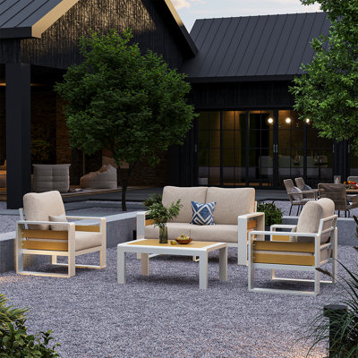 4-Person Aluminum Outdoor Conversation Set With Wood-Plastic Composite Coffee Top & Weather-Resistant Cushions