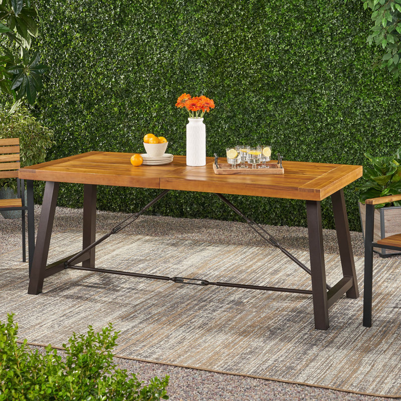 Table de salle à manger d'extérieur en bois d'acacia - finition teck, base en métal thermolaqué