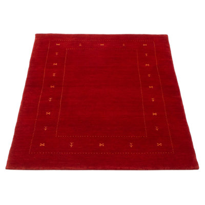 Gabbeh tribal rugs are handmade with extra high pile and very simple, stylized designs.
