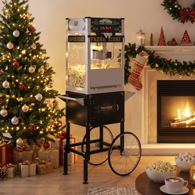  22-ounce Retro-style Cart-Mounted Commercial Popcorn Machine—A portable, upright commercial model equipped with a  popcorn kettle that produces 100+ cups per batch, ideal for movie theaters, parties, and various events