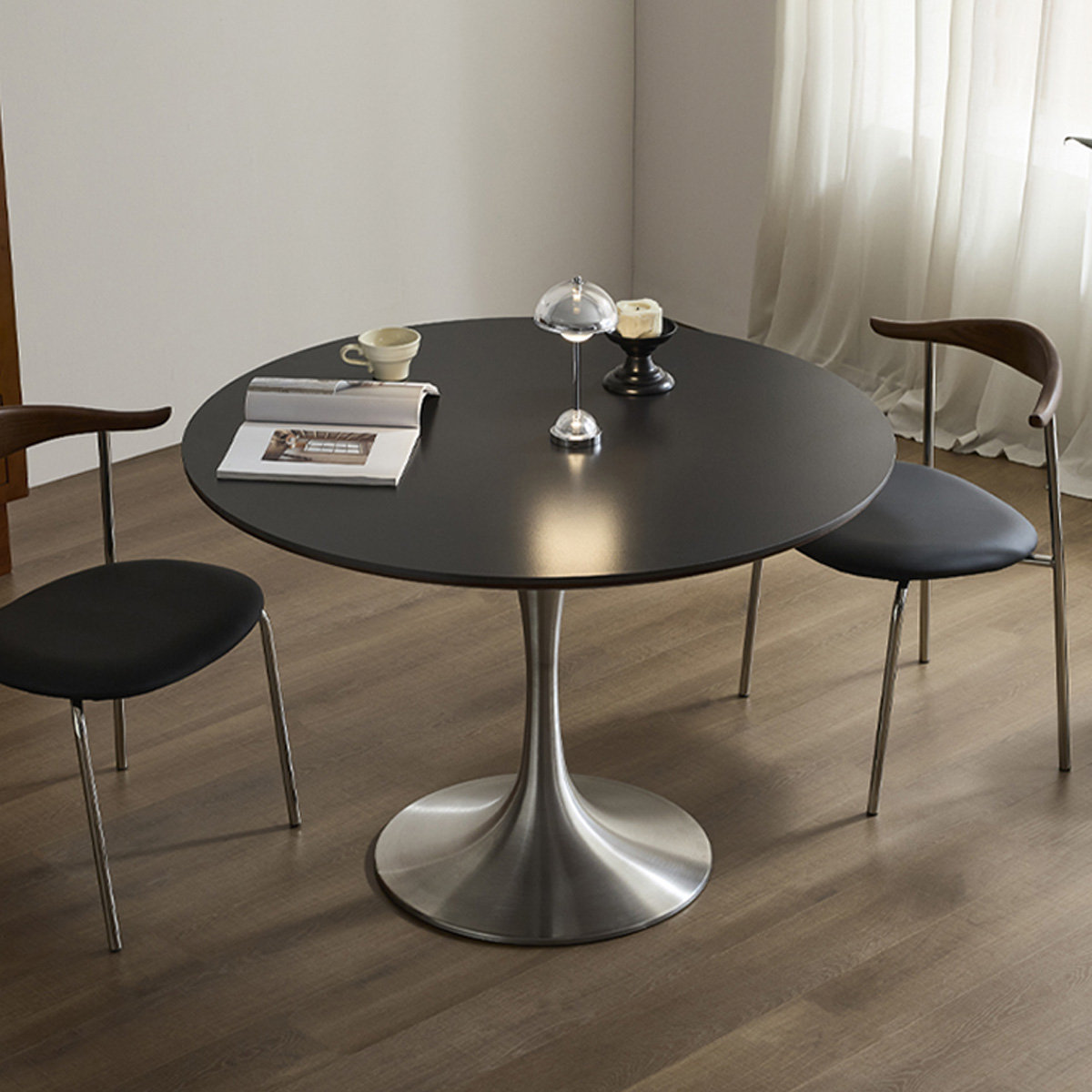 Orren Ellis Silver Round Sintered Stone Dining table - Wayfair Canada
