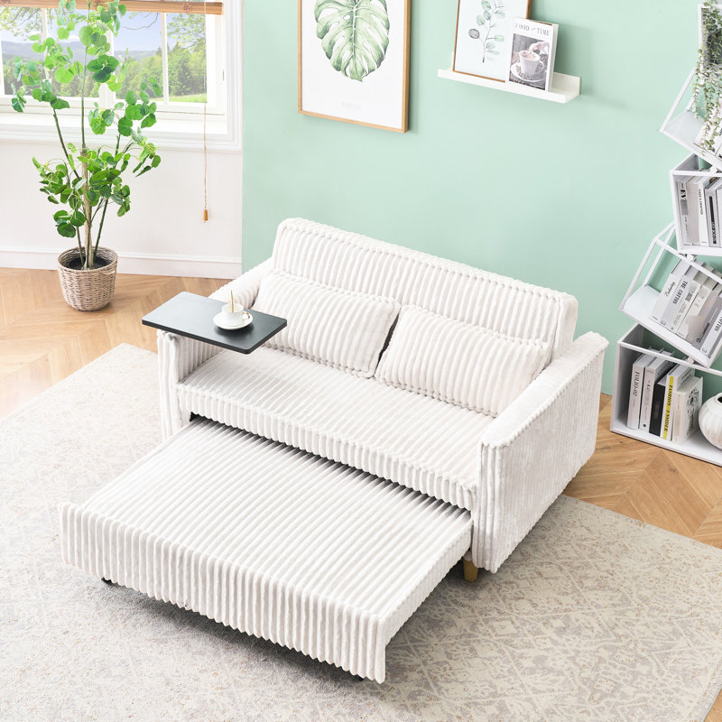 Confortable convertible en velours côtelé beige avec plateau de table mobile et, améliorant votre confort et votre table, pour travailler