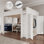 Grand lit mezzanine en bois avec garde-robe et bureau, tête de lit avec rangement et port USB, blanc