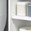 Armoire de rangement au-dessus de la toilette