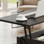 Table basse noire réglable en hauteur de style campagnard avec support en bois en forme de X, avec 2 tiroirs de rangement et un compartiment caché, convenant aux salons.