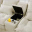 Canapé-lit spacieux en forme de U avec console intégrée, porte-gobelets, ports USB et méridienne.