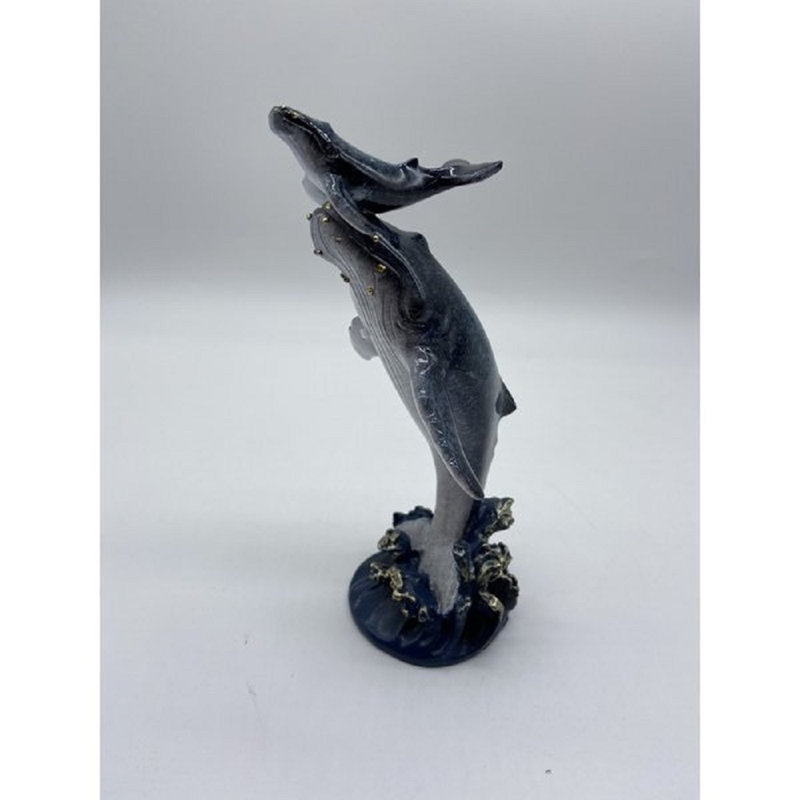 Baleine Lytchett et veau sur la vague
