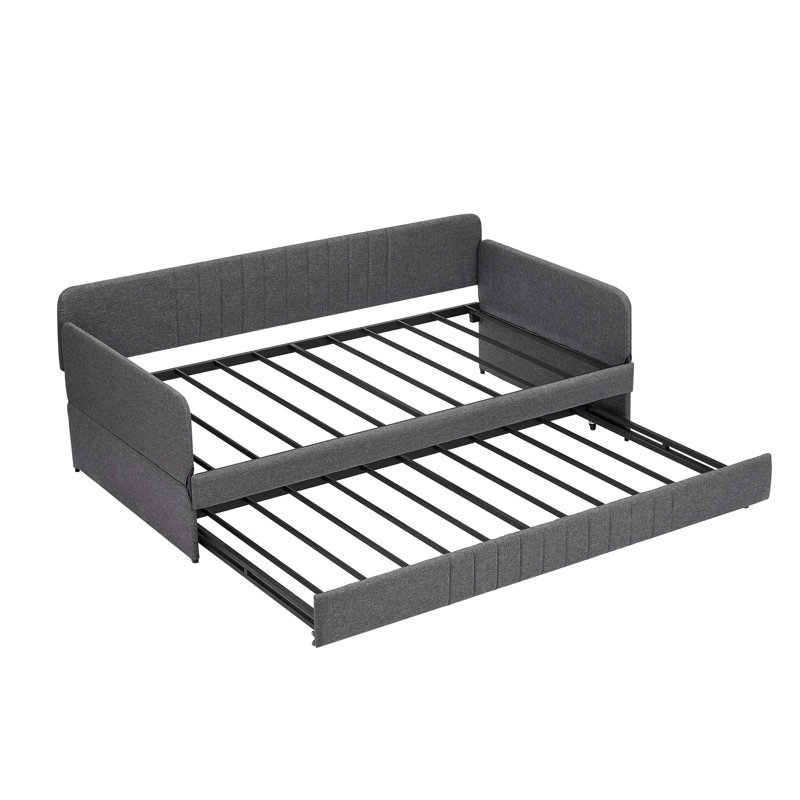 Lit de jour gris simple avec lit gigogne et structure en fer pour un espace de vie moderne et relaxant