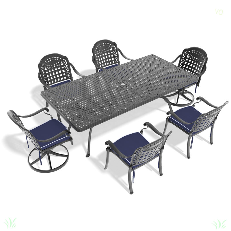 L'ensemble de salle à manger toutes saisons en fonte d'aluminium comprend 2 chaises pivotantes, des chaises et une table rectangulaire
