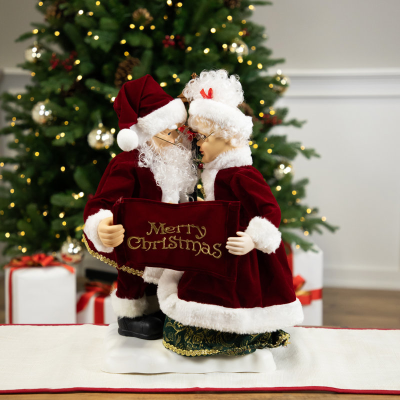 Animated And Musical Mr. And Mrs. Claus Figures With Lighted Lamppost And "Merry Christmas" Sign - 18"