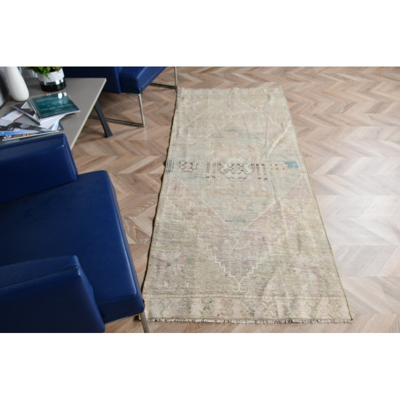 Tapis turc doux de couleur pastel rétro avec motifs géométriques pour un décor de plancher unique de style antique