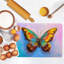 Planche de service en verre rose papillon-114446530