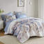 Édredon et drap bleu floral