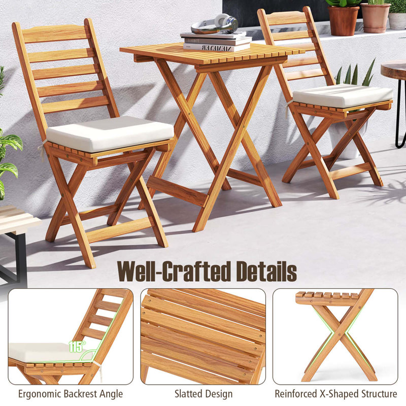 Ensemble bistro 3 pièces d'extérieur pliant en bois d'acacia avec coussins de siège amovibles