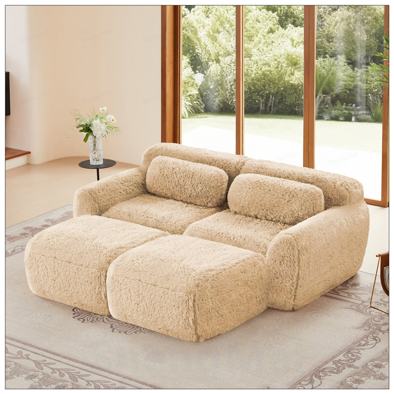 Canapé modulaire en tissu doux et moelleux avec méridienne, repose-pieds et assise profonde pour un confort et une flexibilité ultimes