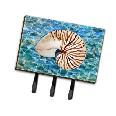 Coquille de mer et laisse d’eau ou porte-clés