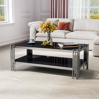 Table basse contemporaine en verre trempé avec structure en acier inoxydable