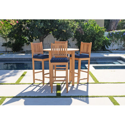 Huntington 4 - Person Wood Patio Dining Set with Round Table , Cushions Included