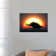A Stegosaurus Silhouetted against the Setting Sun at the End of a Prehistoric Day by Mark Stevenson - Wrapped Canvas Graphic Art